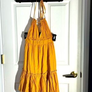 Small yellow sun dress.